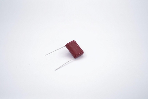 Конденсатор CL21 0,1мкФ 63В ±5% P=10мм (W211J104JK6L00A00C) Weidy